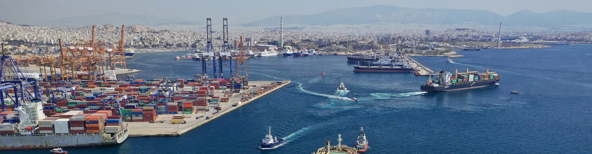 Aerial drone photo of industrial loading - unloading logistics container terminal area of Perama, Piraeus port, Attica, Greece