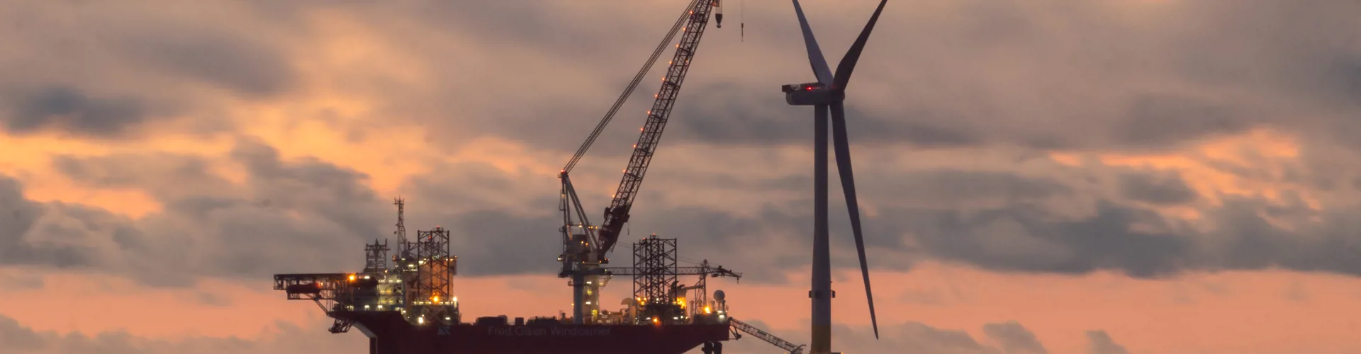 wind turbine instillation undertaking maintenance at an offshore wind farm location