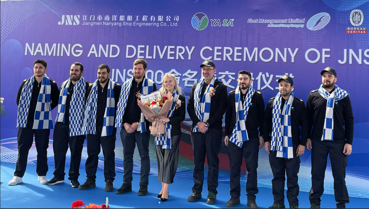 Group photo at a ship naming ceremony.