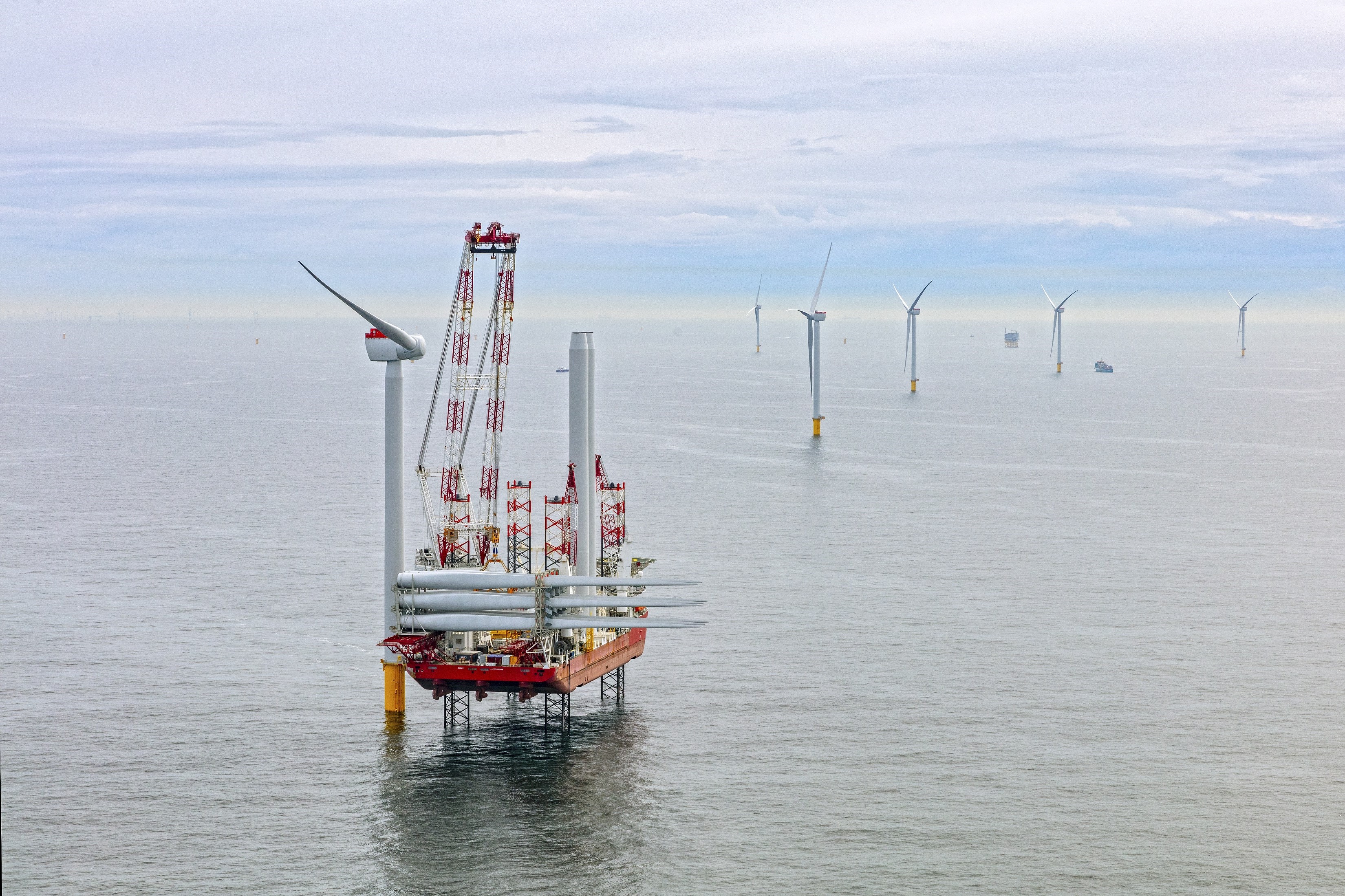 Offshore wind farm with a specialised vessel and new turbine components.