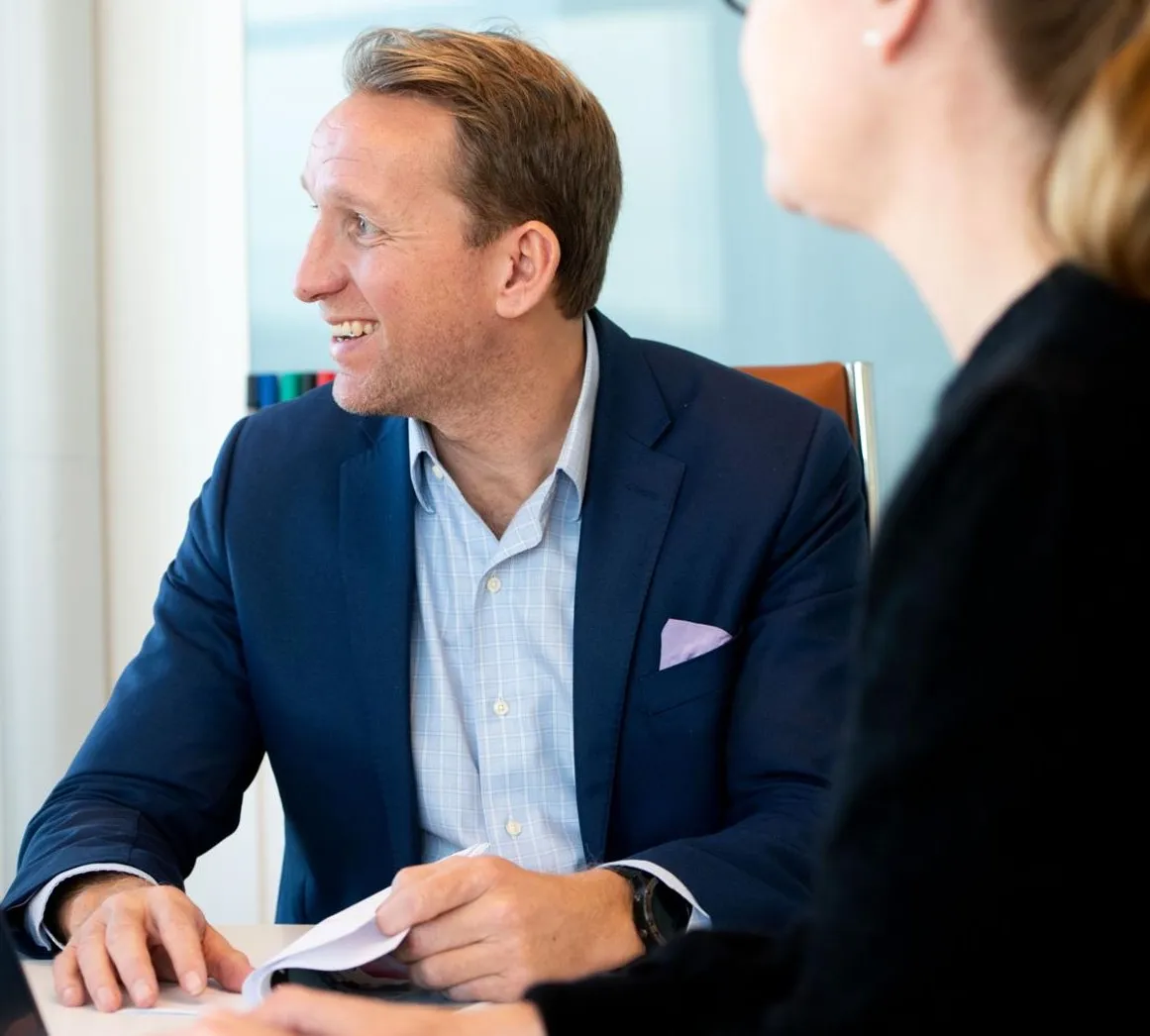 Man in suit smiling