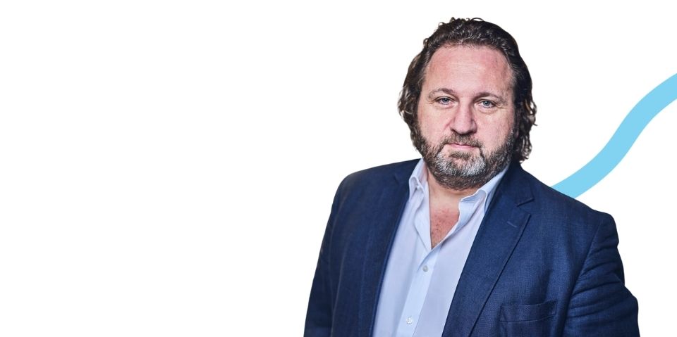 man in suit, blue and white background