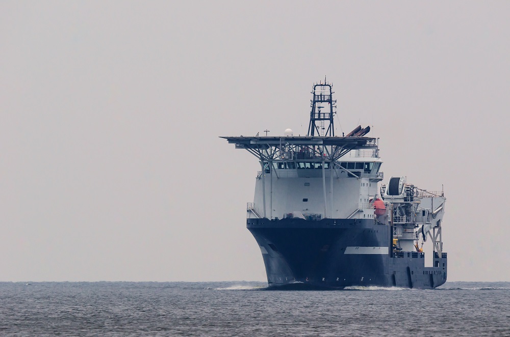 Large ship navigating on calm waters.