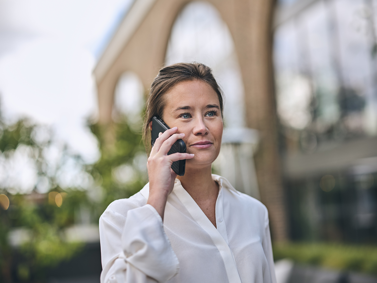 woman outside on the phone