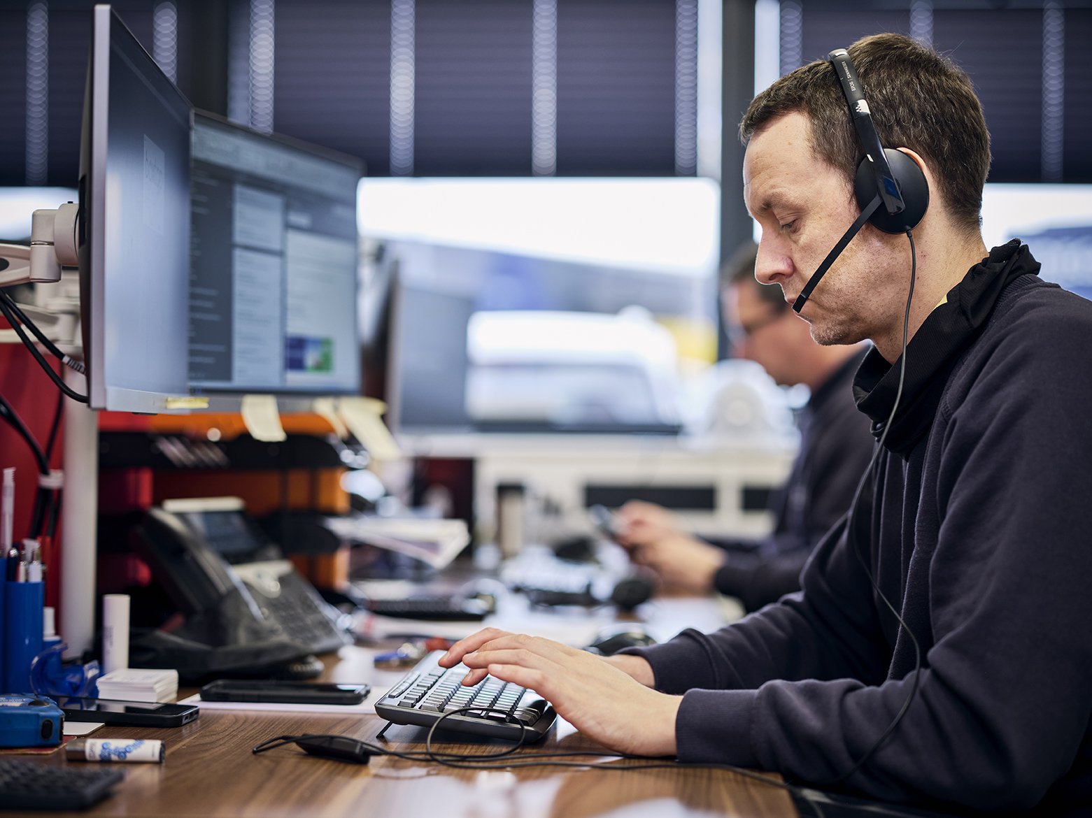 Freight operator at work on the phone