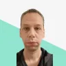 Person with short hair and neutral expression.